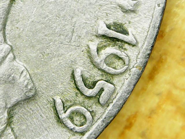 Is-This-A-Die-Chip-On-The-Monticello-Of-This-1959-D-Nickel?